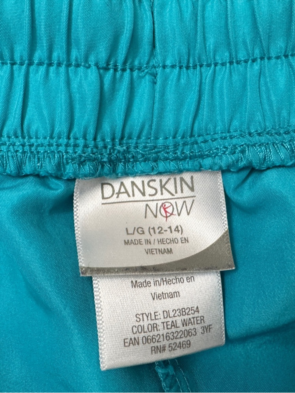 Danskin Now Teal Athletic Shorts with White Trim - Picture 3 of 4